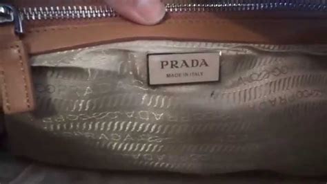 how can you tell if a prada purse is real|prada serial number check.